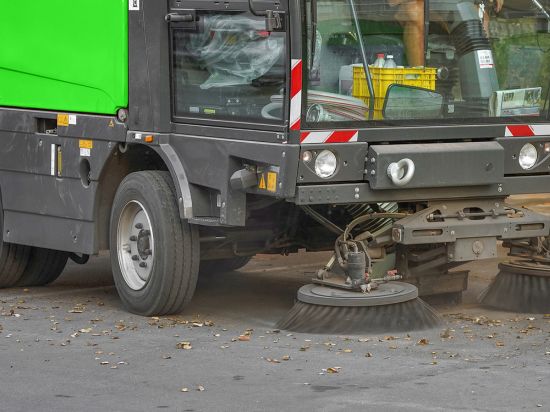 Why HOAs Should Hire Professional Parking Lot Sweepers